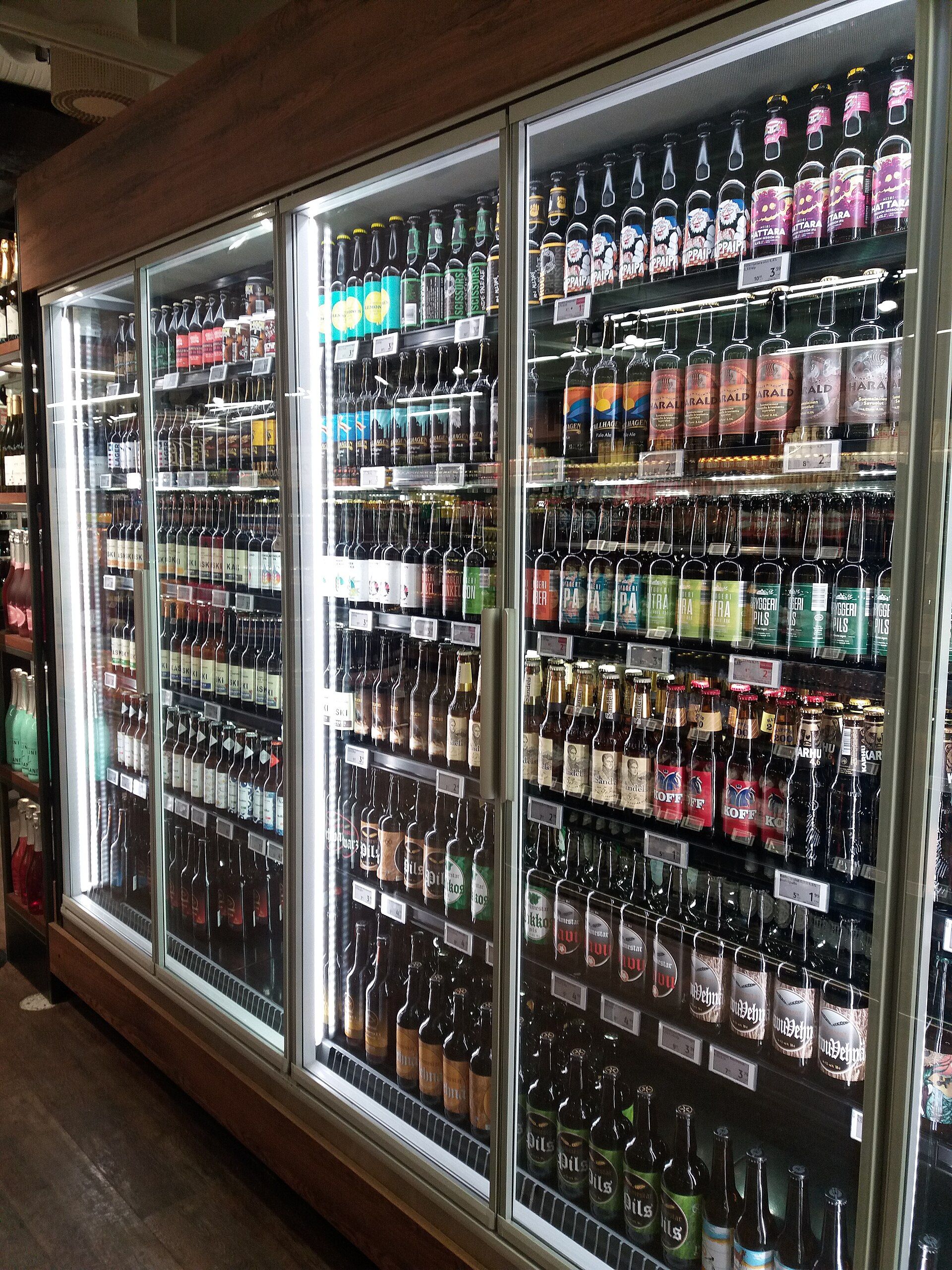 Glass-door coolers filled with craft beer