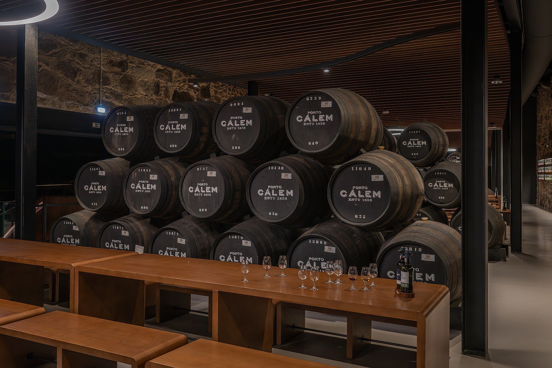 Rows of aging barrels in a cellar