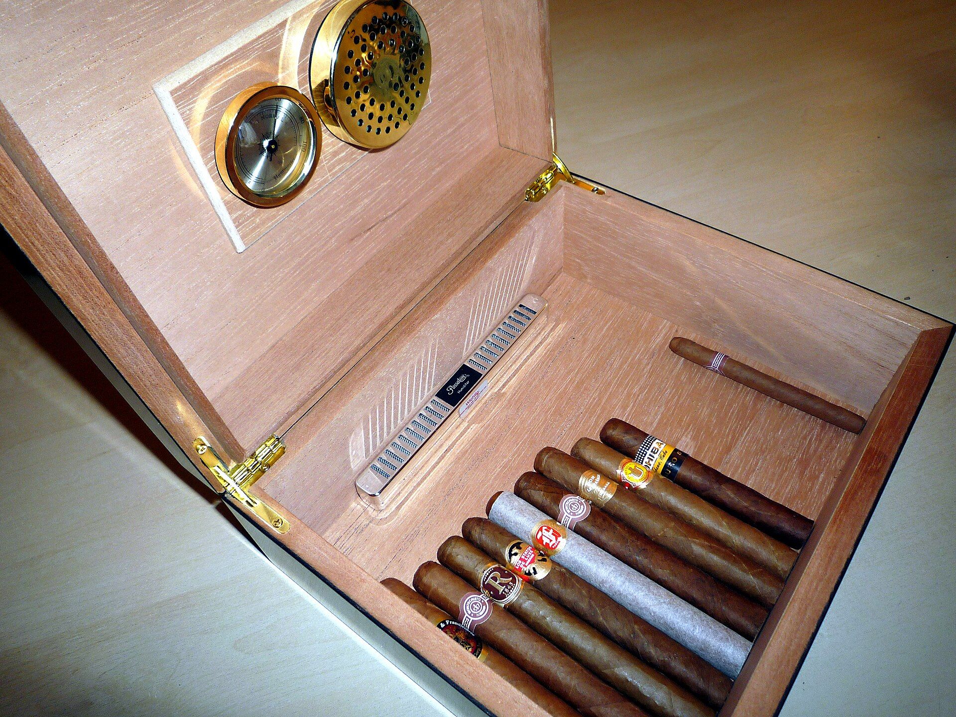 Premium cigars inside a humidor