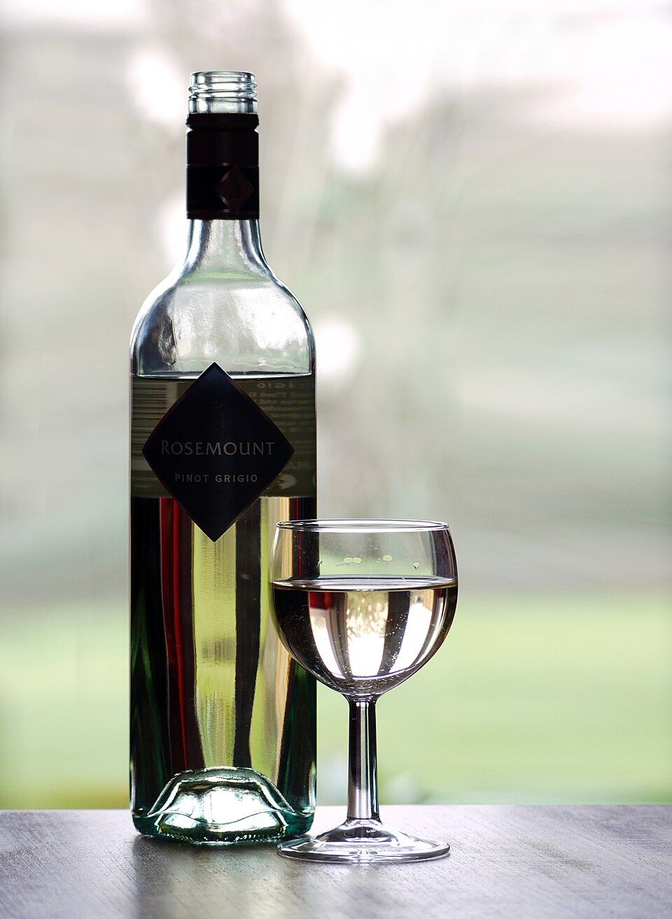 A bottle and glass of Rosemount Pinot Grigio